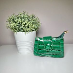 Emerald green tiny bag.
